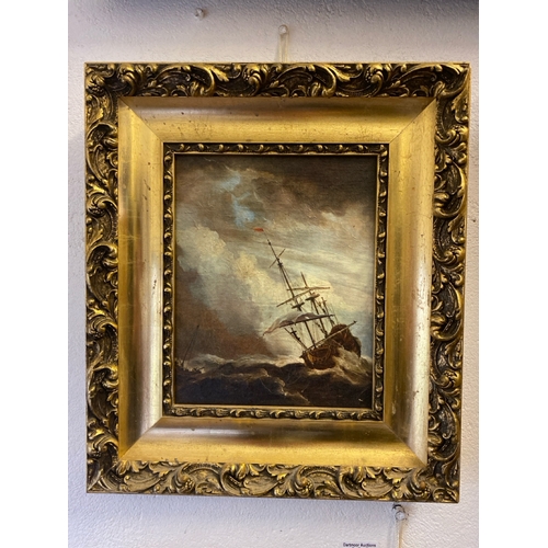 408 - Overpainted print on canvas of ships in stormy seas, gilt frame approx 39cm x 34cm