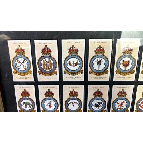 49 - Framed set of Players Cigarettes RAF Royal Air Force squadron emblem design cards, frame approx 47cm... 