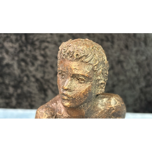 5 - Heredities Karin Jonzen Collection cold case bronzed resin figure of a crouching boy, 17.5cm tall