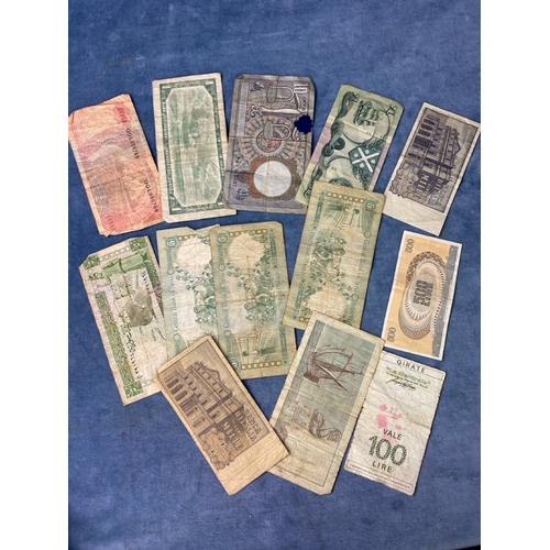 513 - A collection of Indonesian, Scottish, Netherlands, Italian, Syrian and Canadian old bank notes