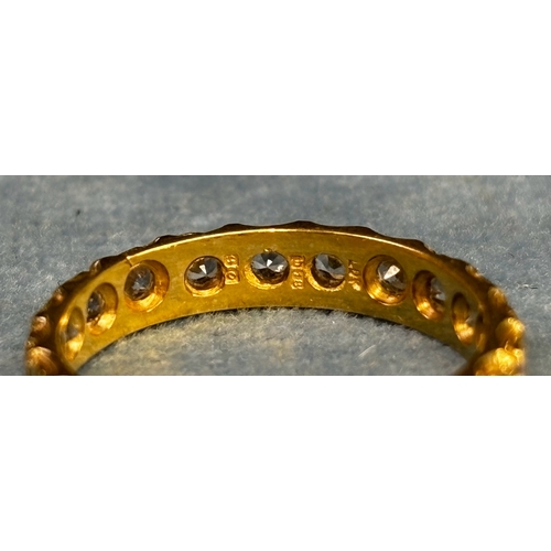 596 - 18ct gold and diamond eternity ring, 2.9g, size N