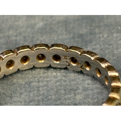 598 - Indistinctly marked white metal and diamond eternity ring, 2.75g, size O