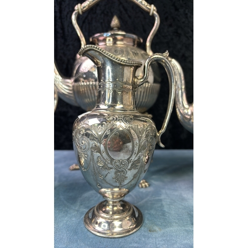 61 - Victorian silver plated heavily decorated spirit kettle with claw feet and pine cone finial in excel... 