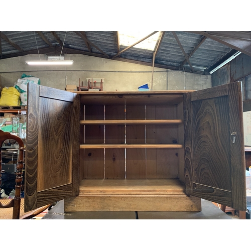 631 - Small antique oak cupboard with 2 interior shelves.  H65cm x W75cm x D34cm.