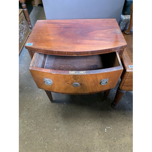 634 - Mahogany bow fronted small chest of drawers.  Flame fronted drawers with decorative metal drop handl... 