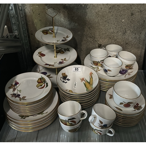 65 - Large collection of Royal Worcester Evesham Gold Edge dinner service items including a cake stand, 8... 