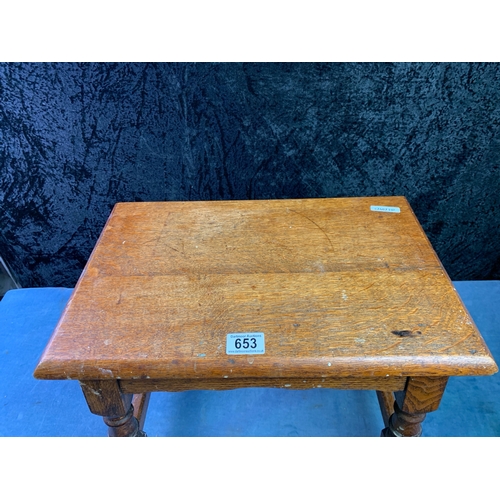 653 - Small solid oak occasional table.  H38cm x W46cm xD30cm.