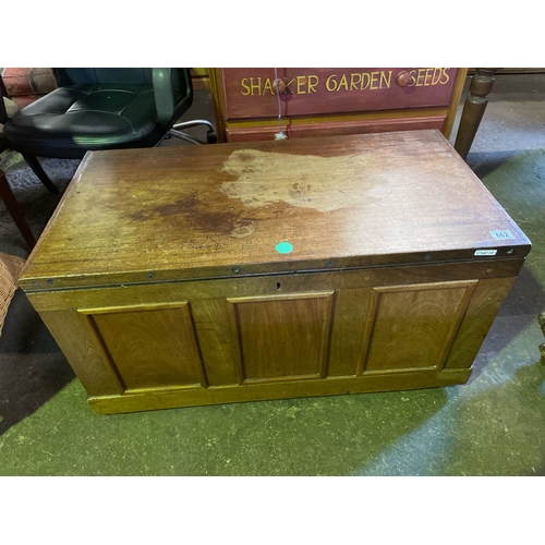 662 - Panelled hardwood storage chest with hinged lid.  H50cm x W95cm x D50cm.