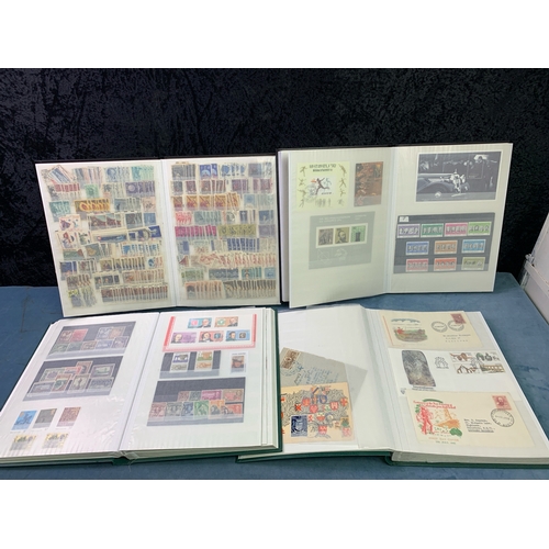 700 - A very exciting collection of 4 albums, one crammed with more moden international stamps, another wi... 