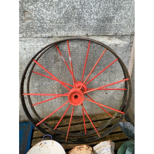 726 - Antique cast iron wagon wheel, 112cm diameter