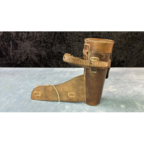 83 - A leather saddle cup/flask holder with crown mark L 28cms