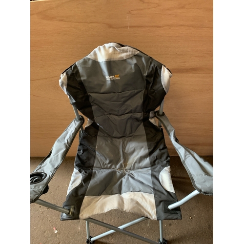 848 - A beach windbreaker and a collapsible picnic chair in carry case