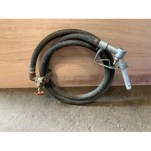 850 - Fill Rite diesel tank transfer hose with fittings.