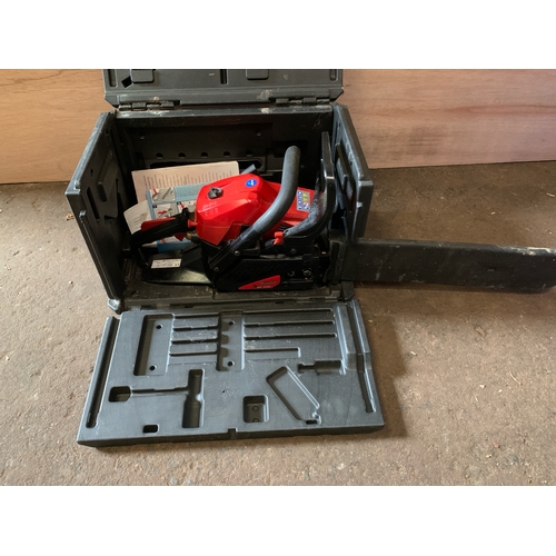 879 - A Euro 2 petrol chainsaw in useful carry case