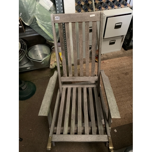 893 - A garden steamer chair with cushions