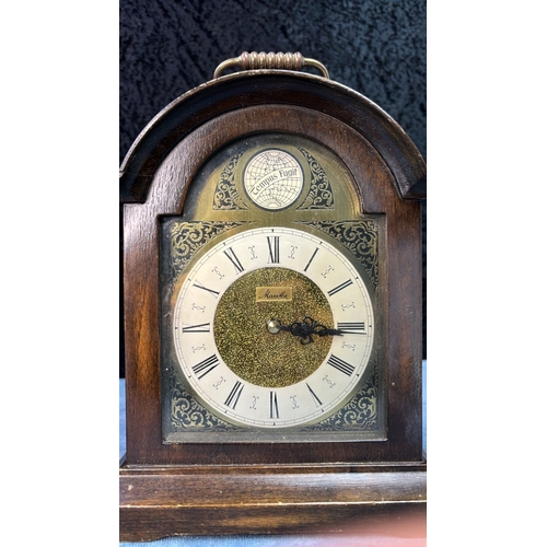 9 - Two wooden cased mechanical winding mantle clocks by Elliott and Mauthe, both approx 23.5cm tall, bo... 