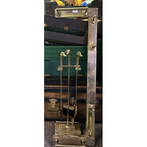 1 - Brass fender and fireside companion set with duck handles (quack)