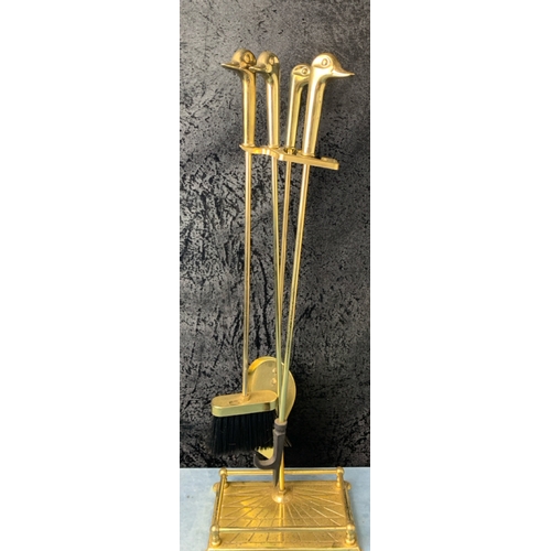 1 - Brass fender and fireside companion set with duck handles (quack)