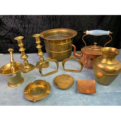 58 - Good collection of brass and copper ware including planter, kettle, jug, candlesticks, pestle and mo... 