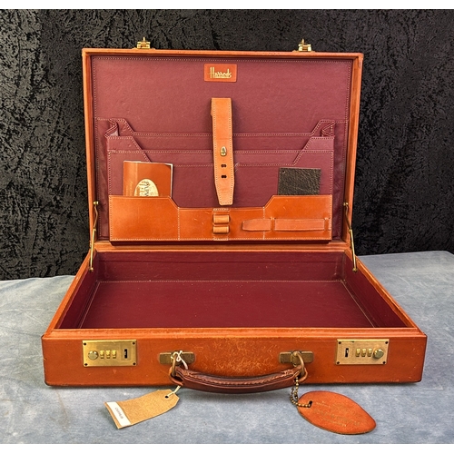 112 - Harrods Papworth briefcase, an Etienne Aigner leather back with two Mulberry leather teddy bear keyr... 