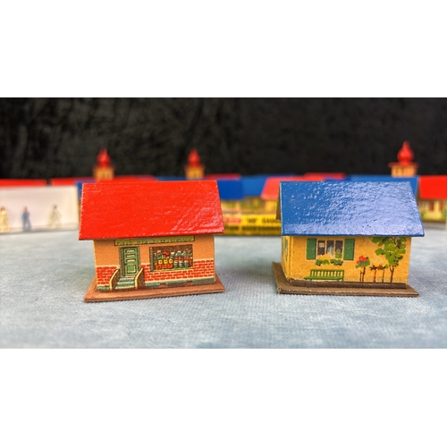 127 - Collection of vintage German model buildings suitable for railway dioramas, a Merit accessories box ... 