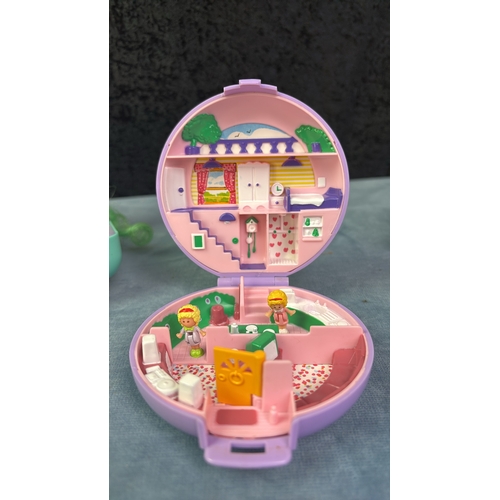 140 - Four vintage Polly Pocket sets