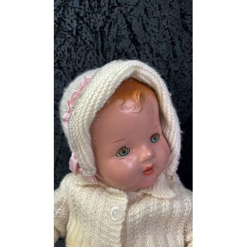 145 - Vintage 1950s Pedigree doll in knitted outfit with a baby blanket