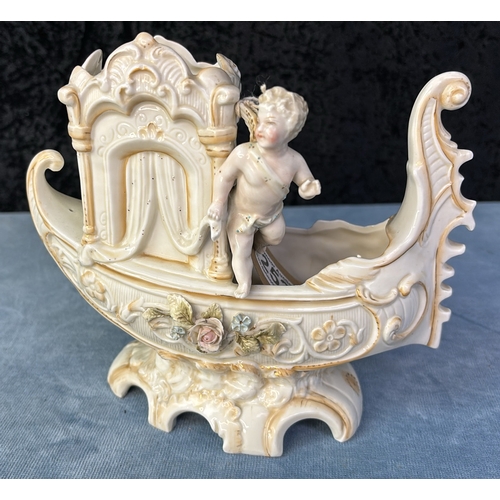 253 - Exquisite antique porcelain Gondola with cherub, poss vase table piece. H16cm x L19cm