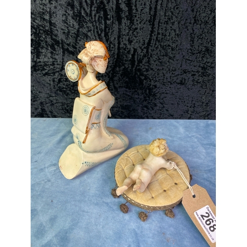 268 - Vintage Geisha Girl figurine cream with blue and gold detail H20cm together with a vintage Capodimon... 