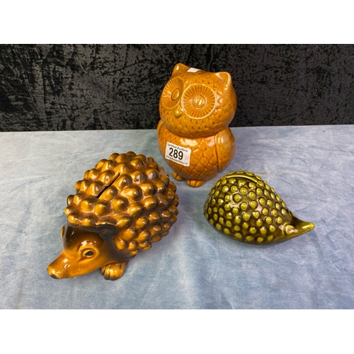 289 - Trio of money banks inc Denmead vintage brown pottery hedgehog, a smaller green hedgehog and an owl ... 