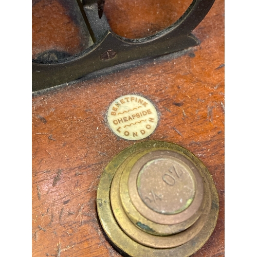 306 - Two sets of antique postal scales, with weights