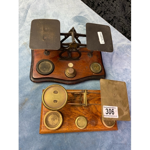 306 - Two sets of antique postal scales, with weights