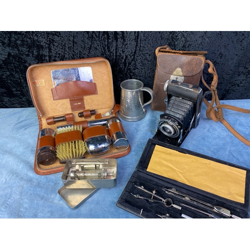 325 - Baldafix folding camera, an Imposil piglet treatment kit in metal tin, a Z8B set of mathematical com... 