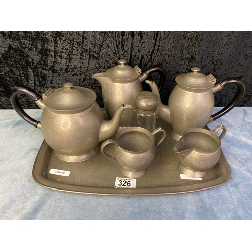 326 - A Civic pewter set consisting of a teapot, two coffee pots / water jugs, milk jug, sugar bowl and ca... 