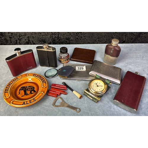 329 - Hip flasks and cigarette cases, a Dalvey travel clock, Fremlins Elephant Ale ashtray and other colle... 