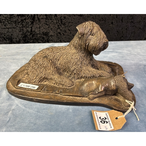 36 - Two resin models of Soft Coated Wheaten Terrier dogs - one standing, approx 22cm tall by T. Acevedo ... 