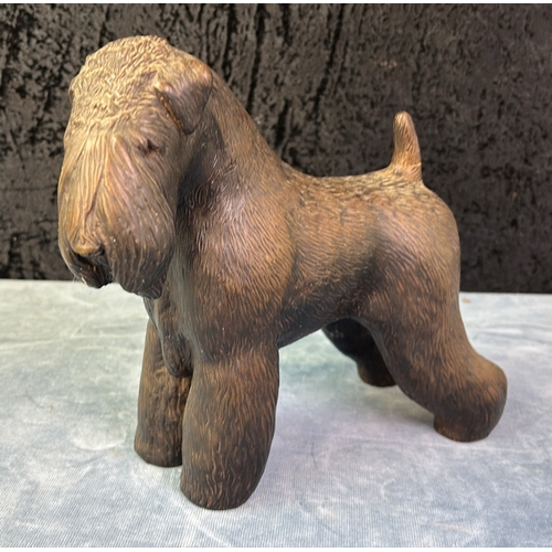 36 - Two resin models of Soft Coated Wheaten Terrier dogs - one standing, approx 22cm tall by T. Acevedo ... 