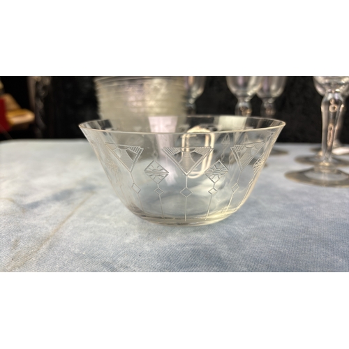 367 - A very fine collection of delicate etched and flutes antique crystal glasses and dessert bowls