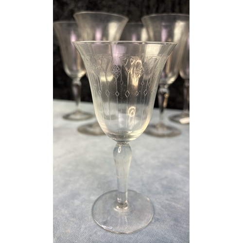 367 - A very fine collection of delicate etched and flutes antique crystal glasses and dessert bowls