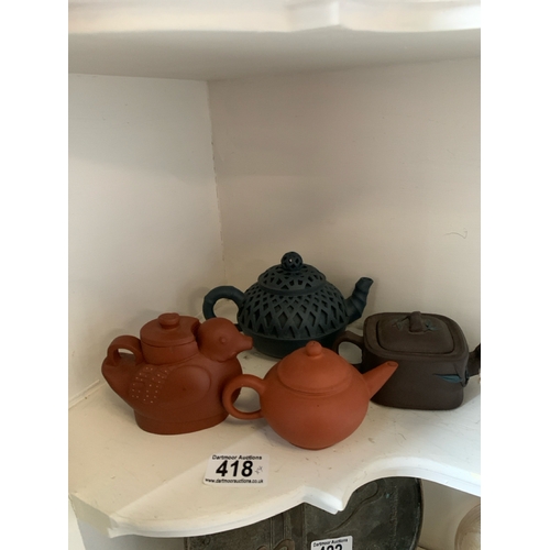 418 - Four small Chinese terracotta teapots, one in the shape of a bird