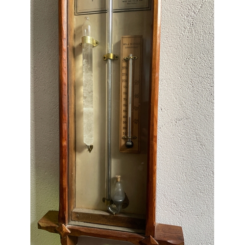 445 - Admiral Fitzroy barometer with internal W.& J George the moment and a storm glass, case  measures ap... 