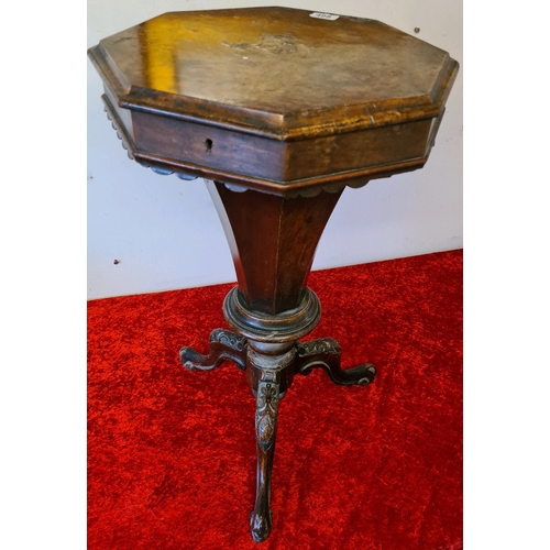 498 - Pedal sewing box table with carved legs, fitted interior with sewing contents (top of table a/f)