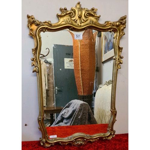 501 - Gilt framed wall hanging mirror, frame approx 74cm x 46cm