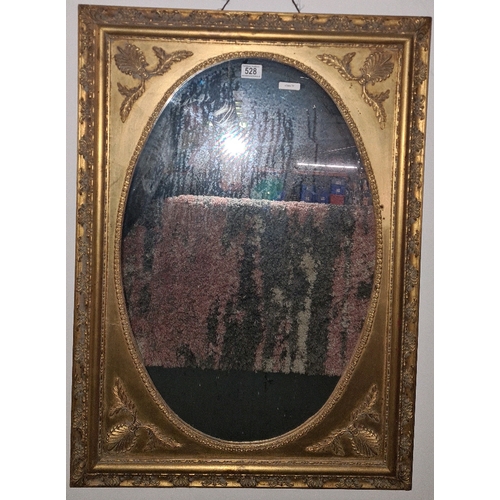 528 - Beautifully gilt framed wall hanging mirror, frame approx 90cm x 66cm