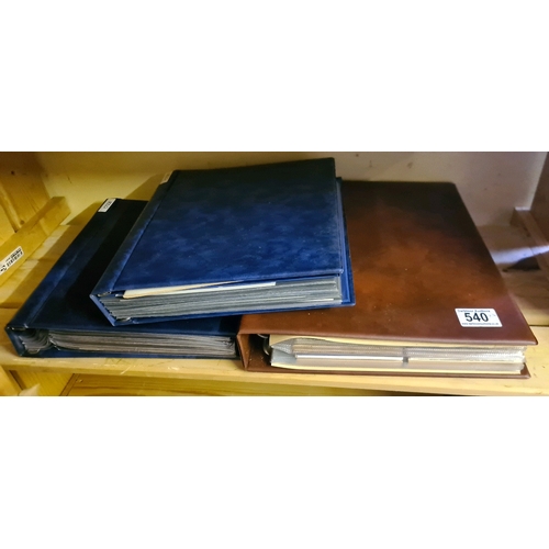 540 - Bound collection of 3 folders containing commemorative and social history postcards, most unused. In... 