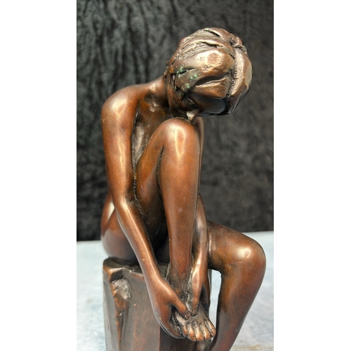 598 - Art Deco style bronze figurine of a naked lady seated on a box, possibly Austrian, maker’s mark to b... 