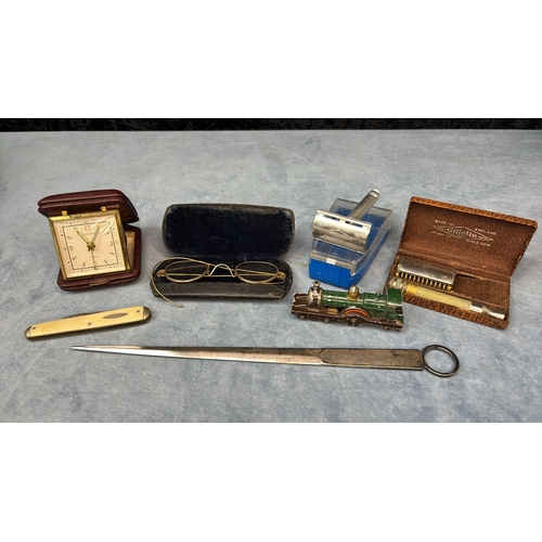 600 - Silver plated letter opener, vintage spectacles and razors, a travel clock penknife and Lesney model... 