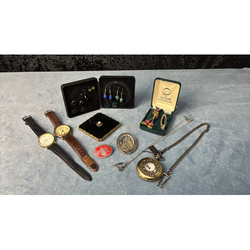 606 - An Ola Gorie silver brooch, a selection of earrings, Stratton compact, two wrist watches, a pocket w... 