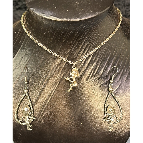 614 - Vintage American Cyvra pixie earrings and a silver chain with a Cyvra pixie pendant