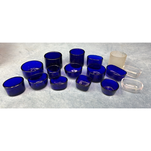 621 - 13 blue and 3 clear glass liners